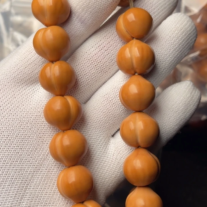 赶***人手串猴头核桃屁桃