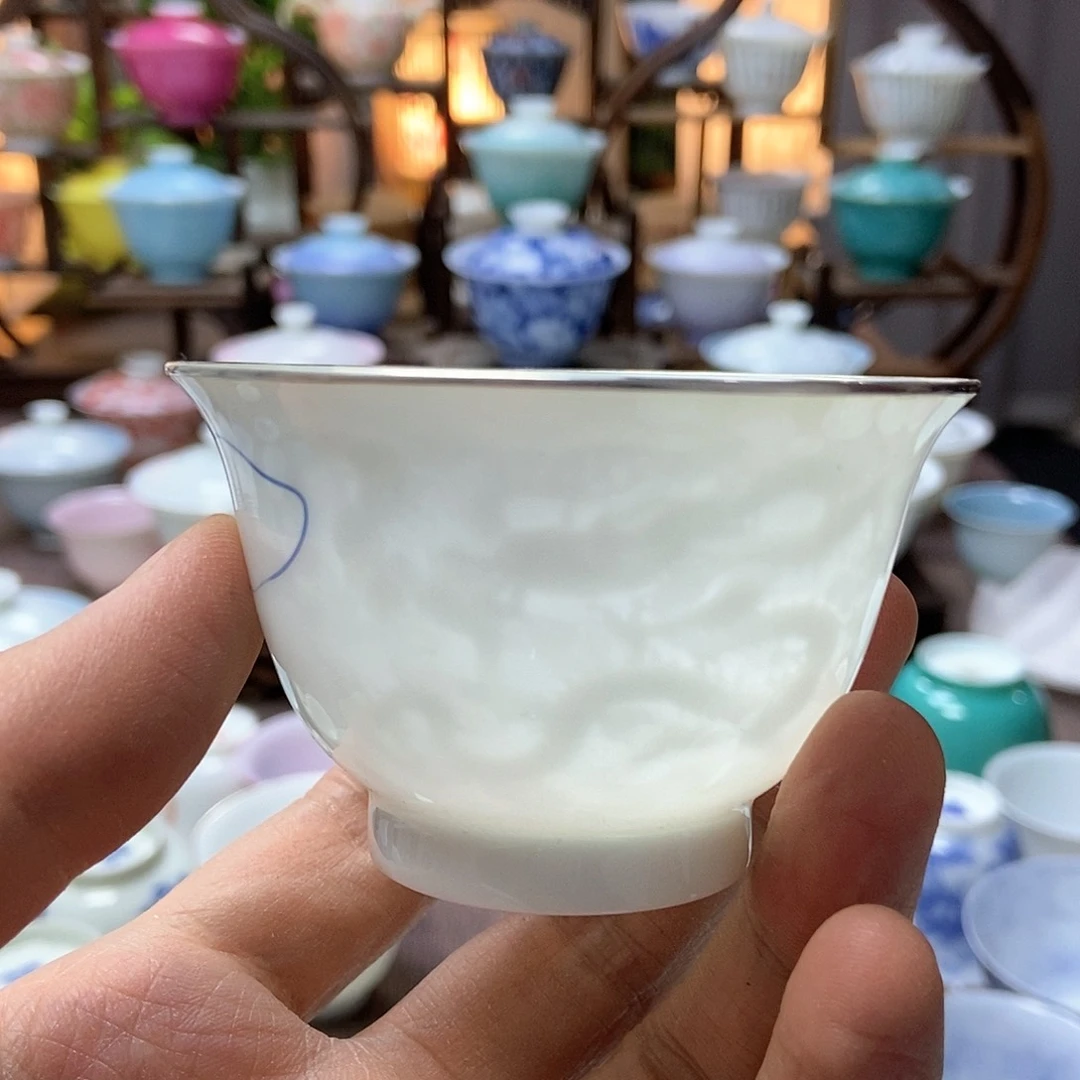 王*天微瑕脱胎瓷高温手工超薄胎内模印暗刻四海游龙主人杯