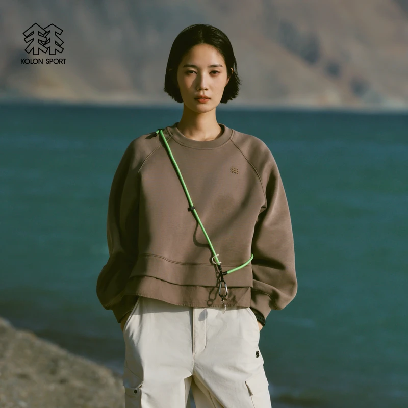 KOLON SPORT可隆户外休闲衣防静电女士露营梭织拼接圆领卫衣