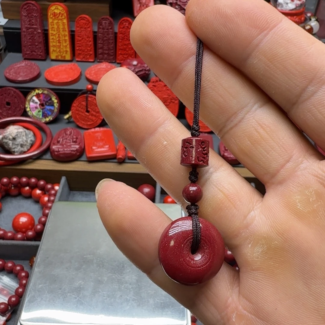 @***份天然辰砂保真高含量紫金砂小号回文平安扣手机挂