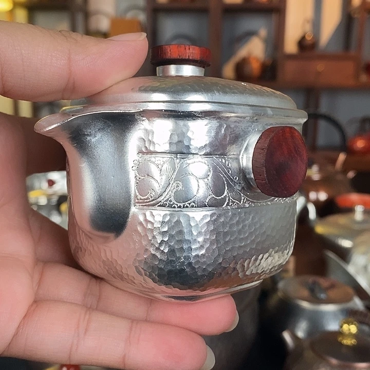 普***照手工制作紫铜壶工艺