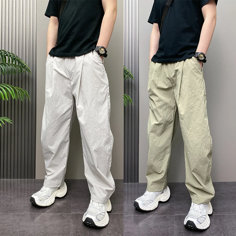 2025年夏季薄款潮流韩版痞帅宽松哈伦裤青年男士休闲直筒阔腿裤子