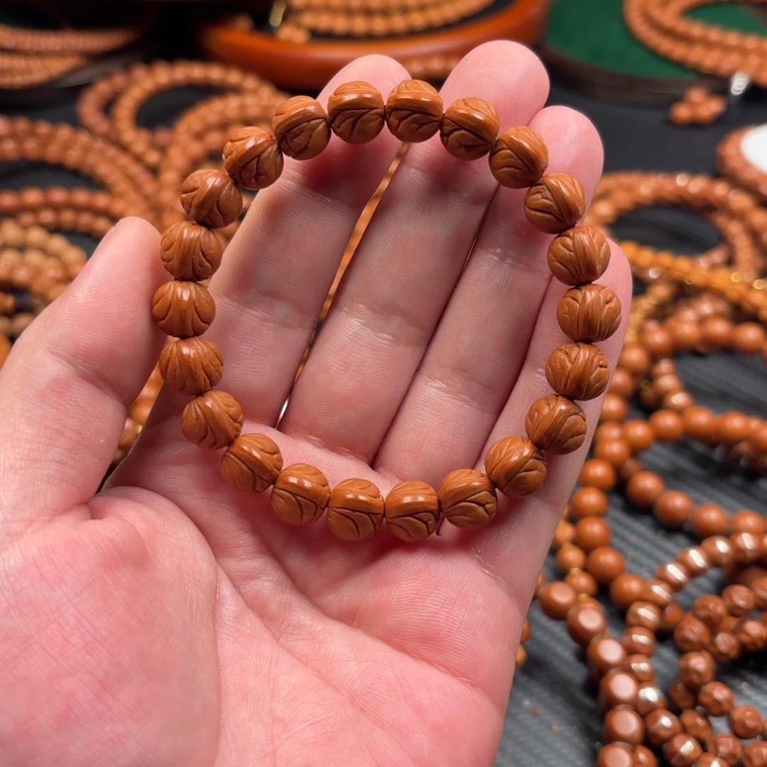 吊坠桃核玉龙脊手串