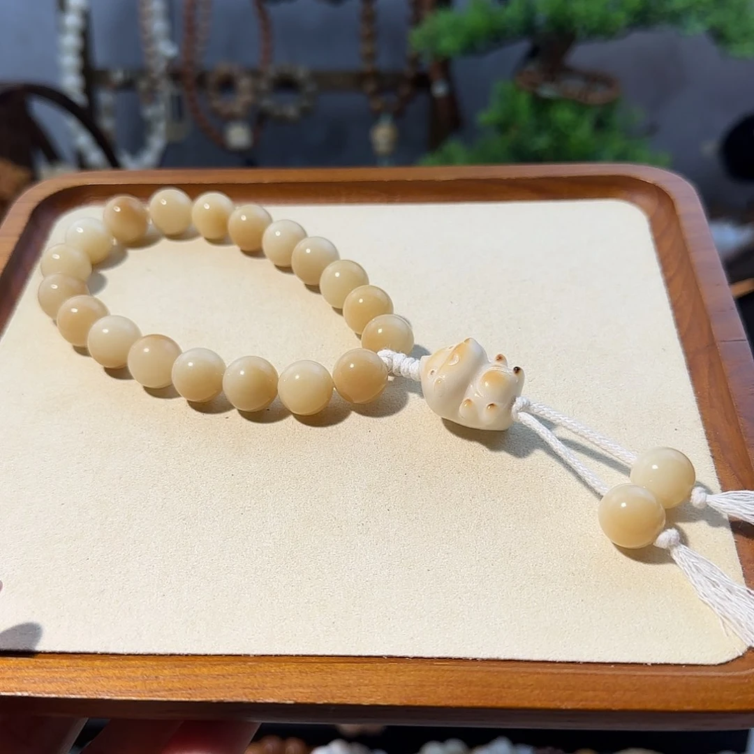 吊坠菩提根/象牙果小手持