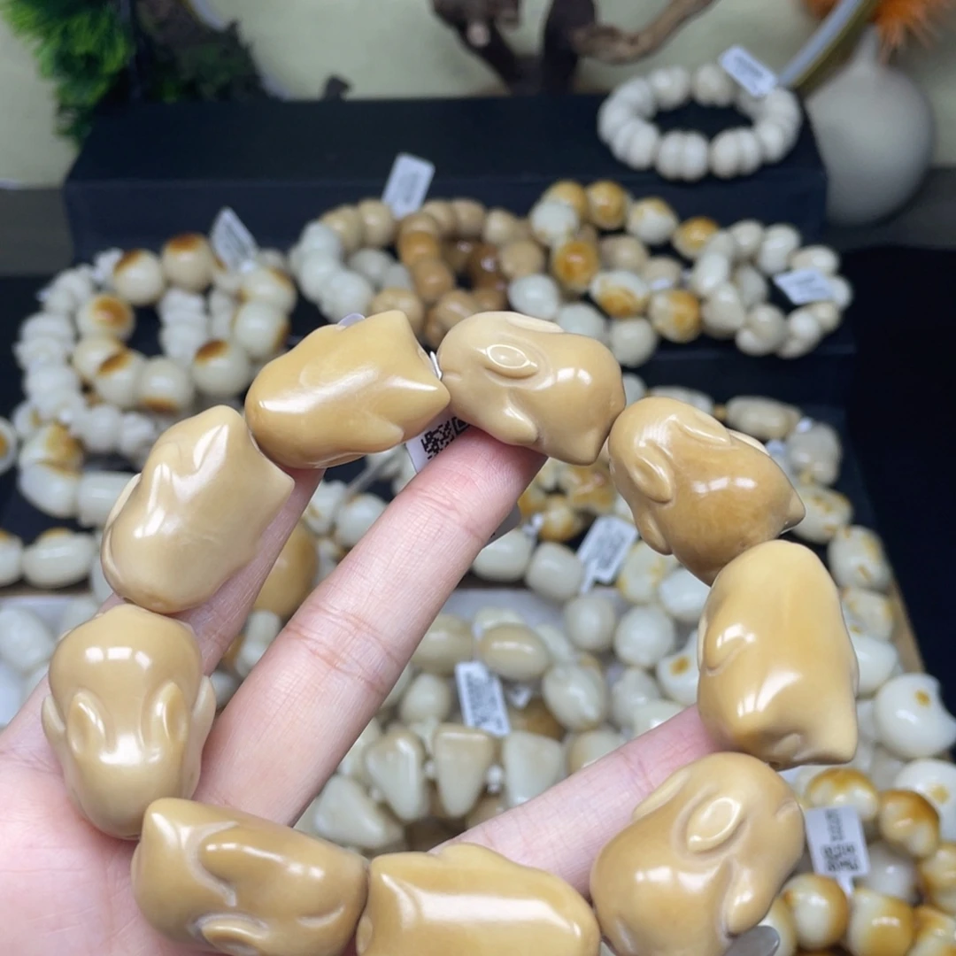 吊坠菩提根/象牙果10830风化色兔子瑕疵