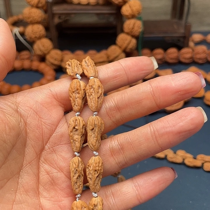 鱼***丸桃核吊坠文玩核桃