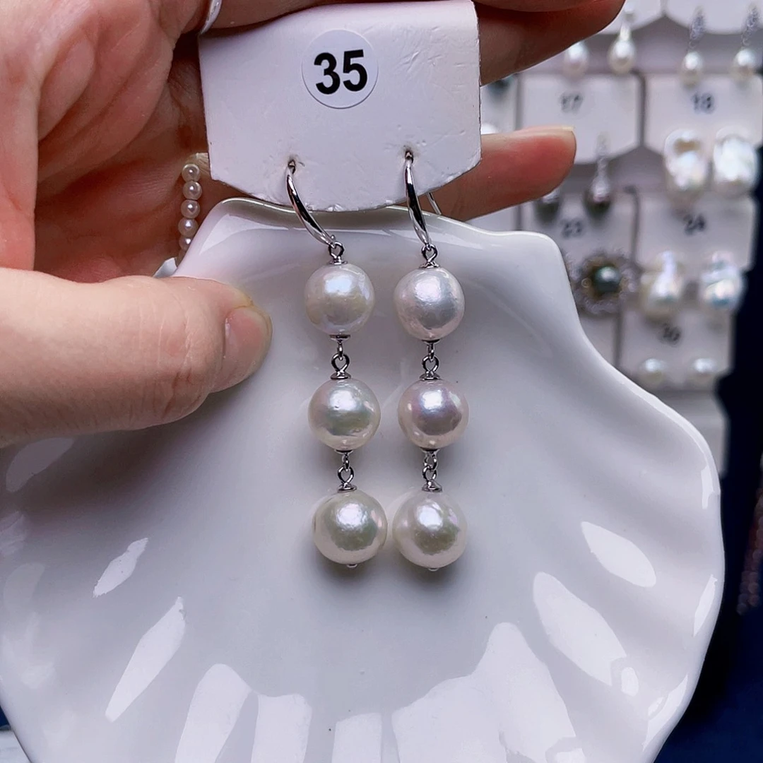 聪***了银S925镶嵌淡水珍珠耳饰