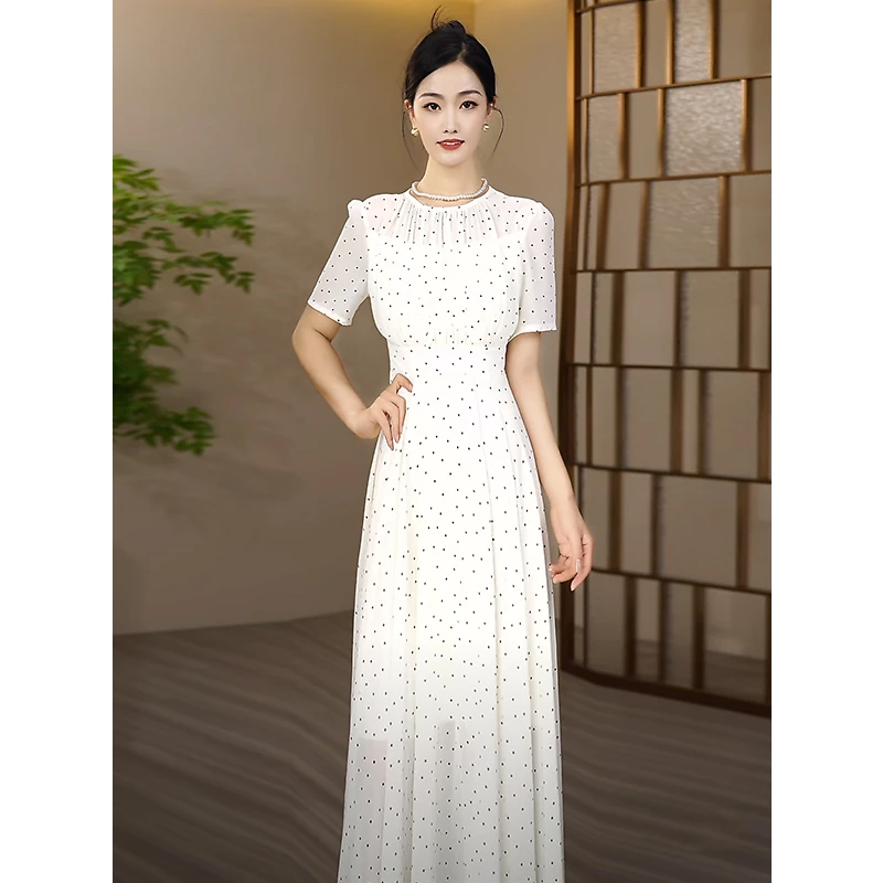 白色波点2025夏新款收腰气质大摆长裙新款撞色波点优雅显瘦连衣裙
