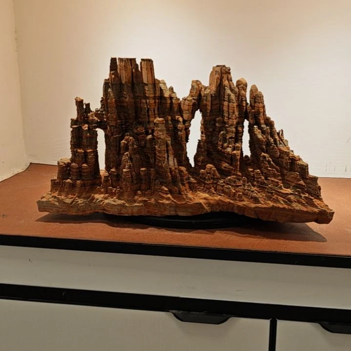 抑***演灵璧石滴水莲花楼兰山