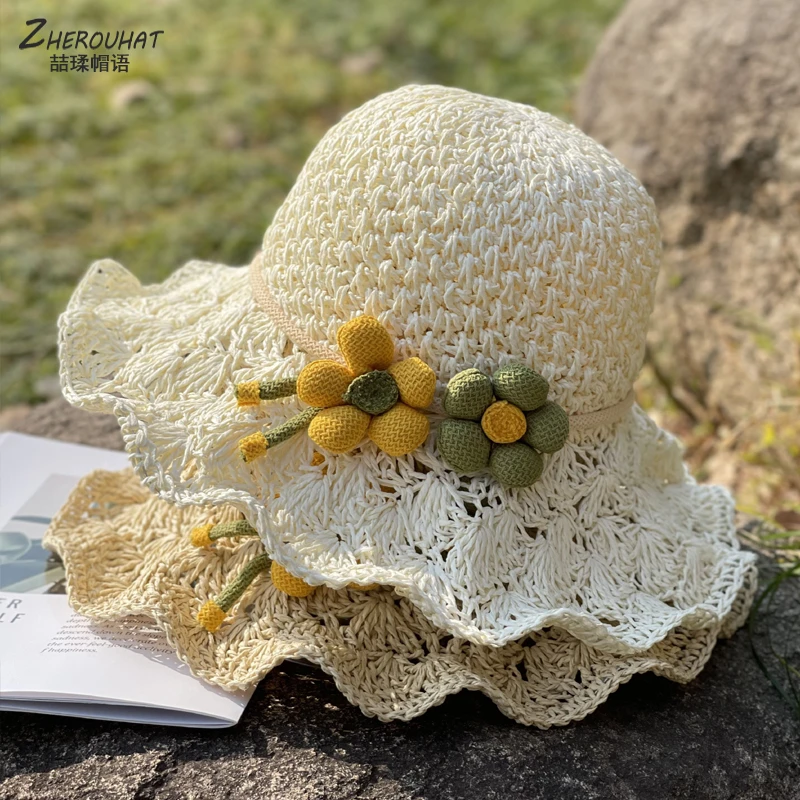 新款草帽女夏天百搭度假旅游遮阳沙滩帽手工镂空布艺花朵渔夫帽子