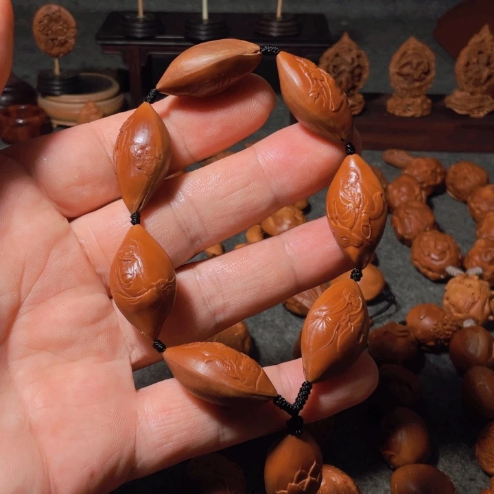 刘***两橄榄核手串/手链手工制作工艺