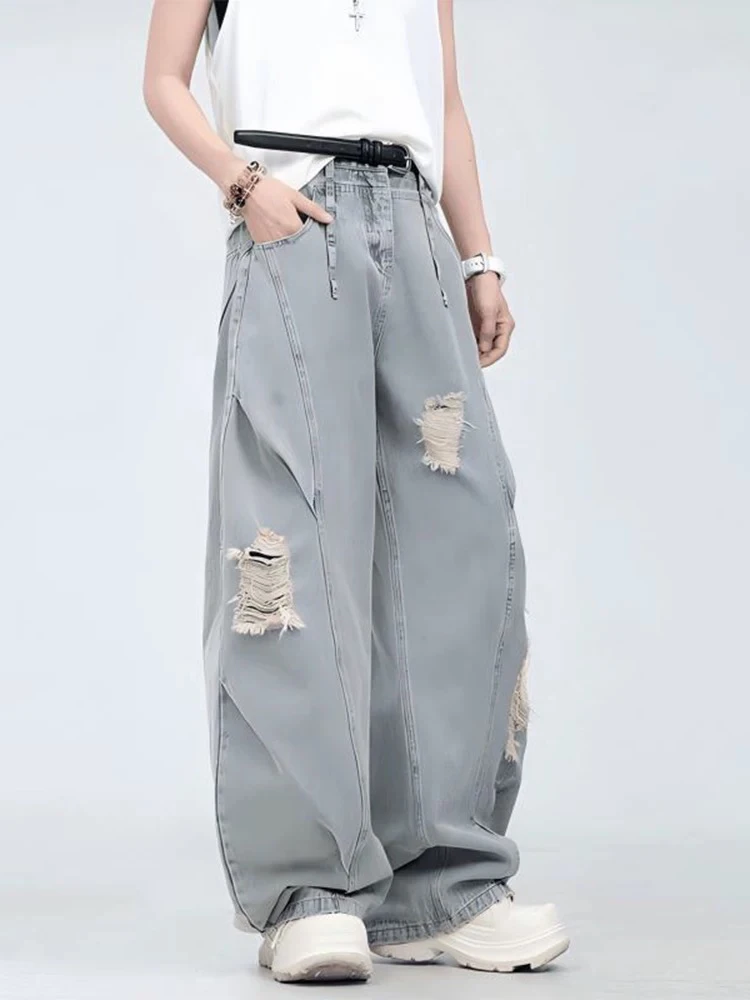 蓝色水洗破洞弯刀牛仔裤男夏季美式高街痞帅裤子宽松直筒阔腿长裤