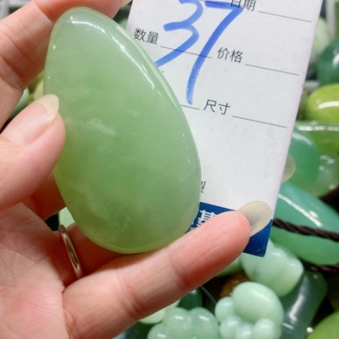 偶***然未镶嵌蛇纹石玉手把件
