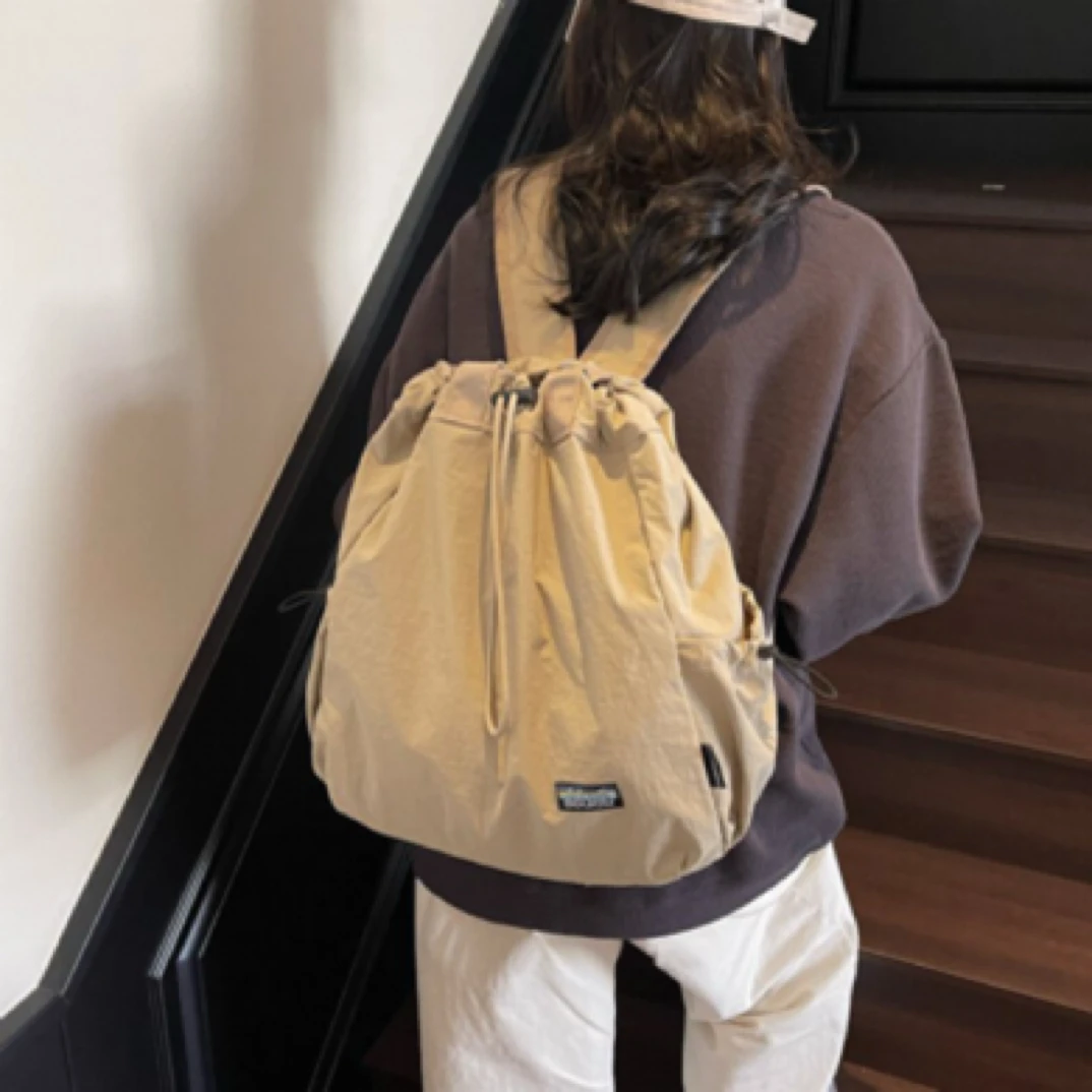 双肩包女2025新款旅游登山大容量旅行背包轻便单肩斜挎大学生书包