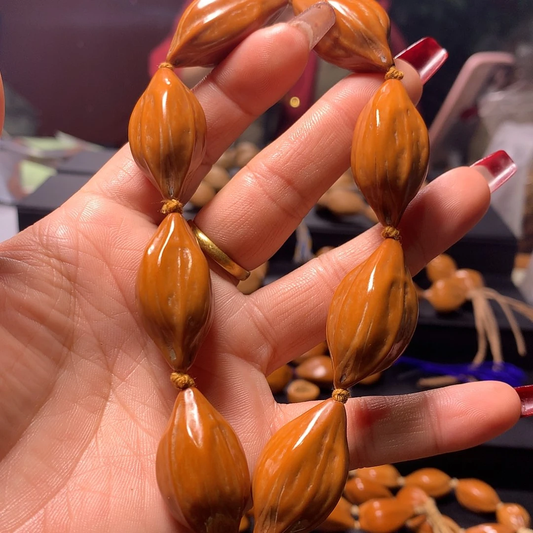 橄榄核手串/手链T****H四花手串