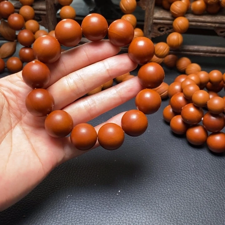 手串橄榄核1.75尺寸树王鸡血红光珠全品