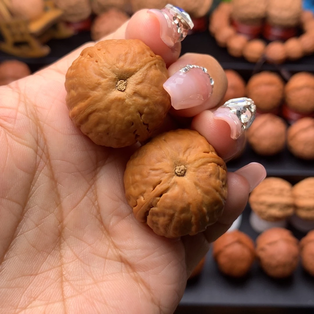 文玩核桃把件淹**鱼核桃