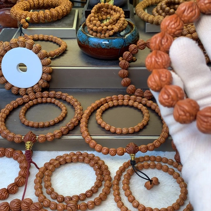 反***儿桃核手串秦岭龙纹