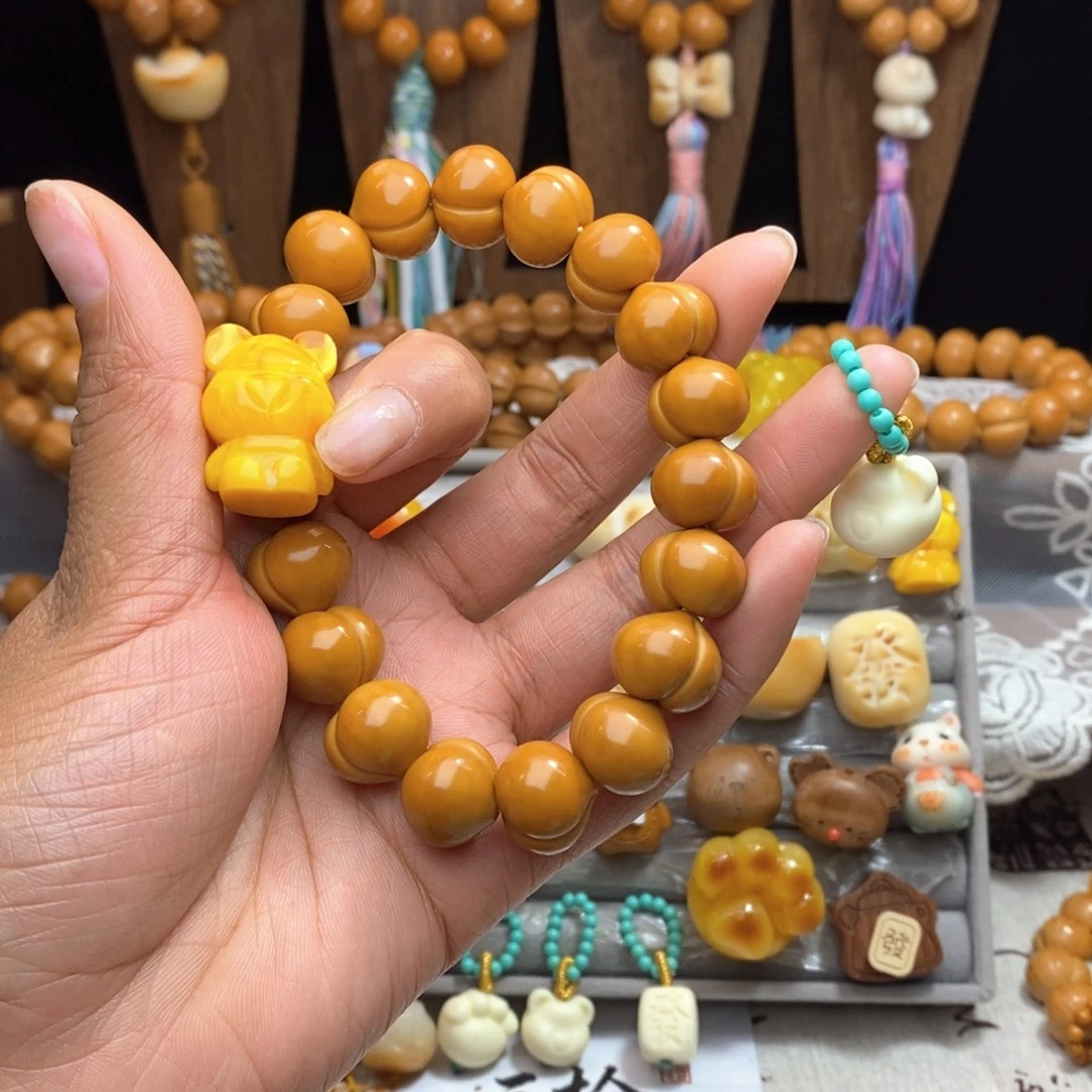 濮***司吊坠猴头核桃屁桃手串