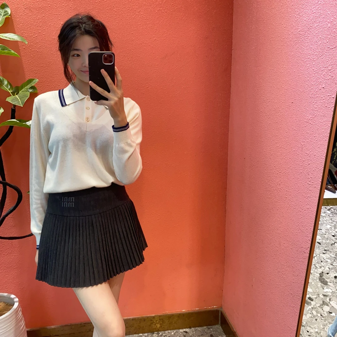 （默茗服装）假两件翻领条纹针织