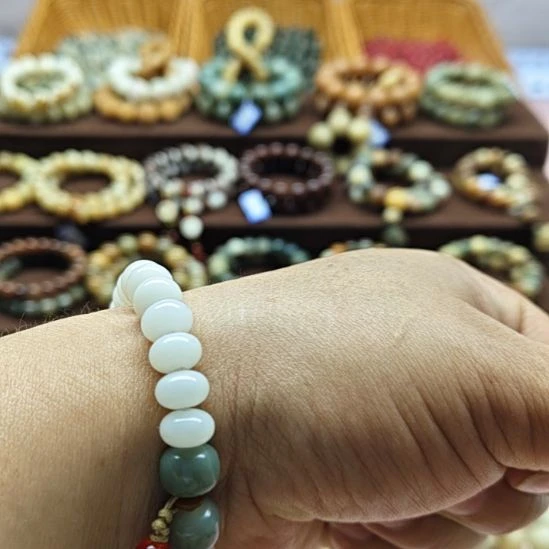 白玉菩提吊坠白玉菩提算盘珠9手串