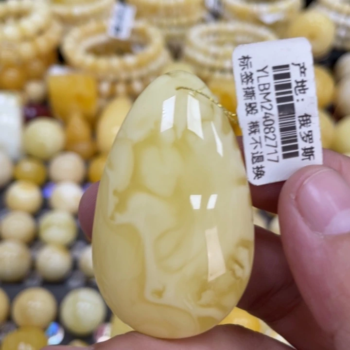 蜜蜡未镶嵌裸石48*29*12mm花粉 妖花水滴
