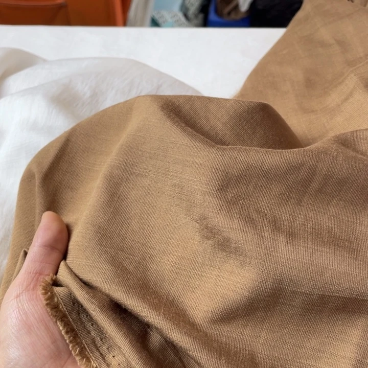 卡其色棉麻2米。