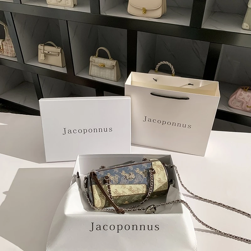 雅各邦真皮马车拼色小圆包女2025新款夏天轻奢高级感小众链条斜挎