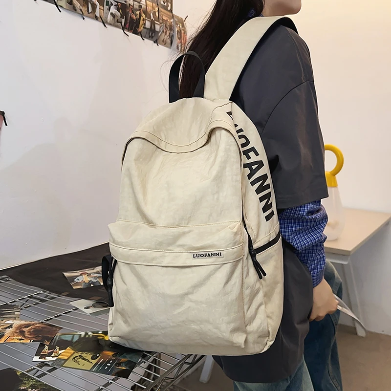 纯色简约双肩包男大容量韩版旅行背包日系初中生高中大学生书包女