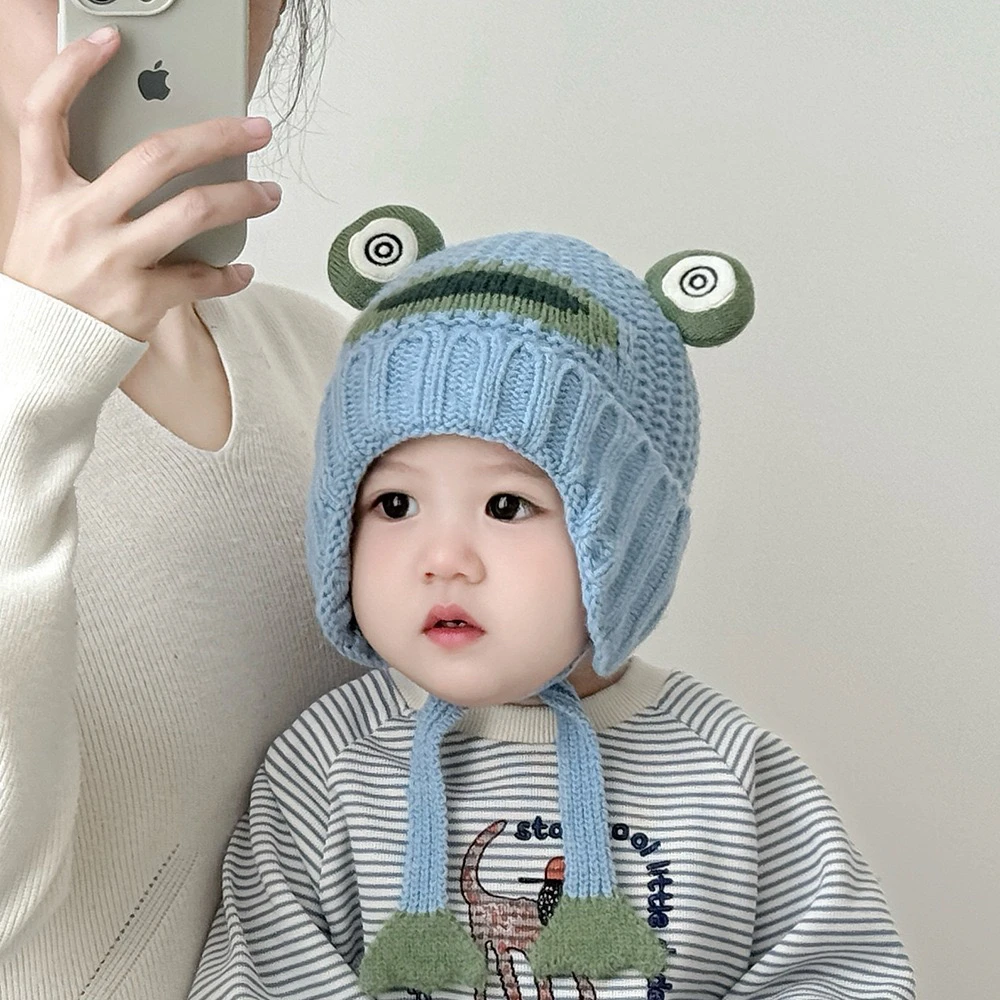 可爱萌娃青蛙大眼睛笑脸针织帽男女宝宝护耳帽韩版防风保暖御寒帽