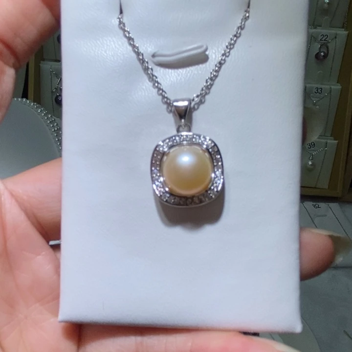 淡水珍珠银S925镶嵌耳饰