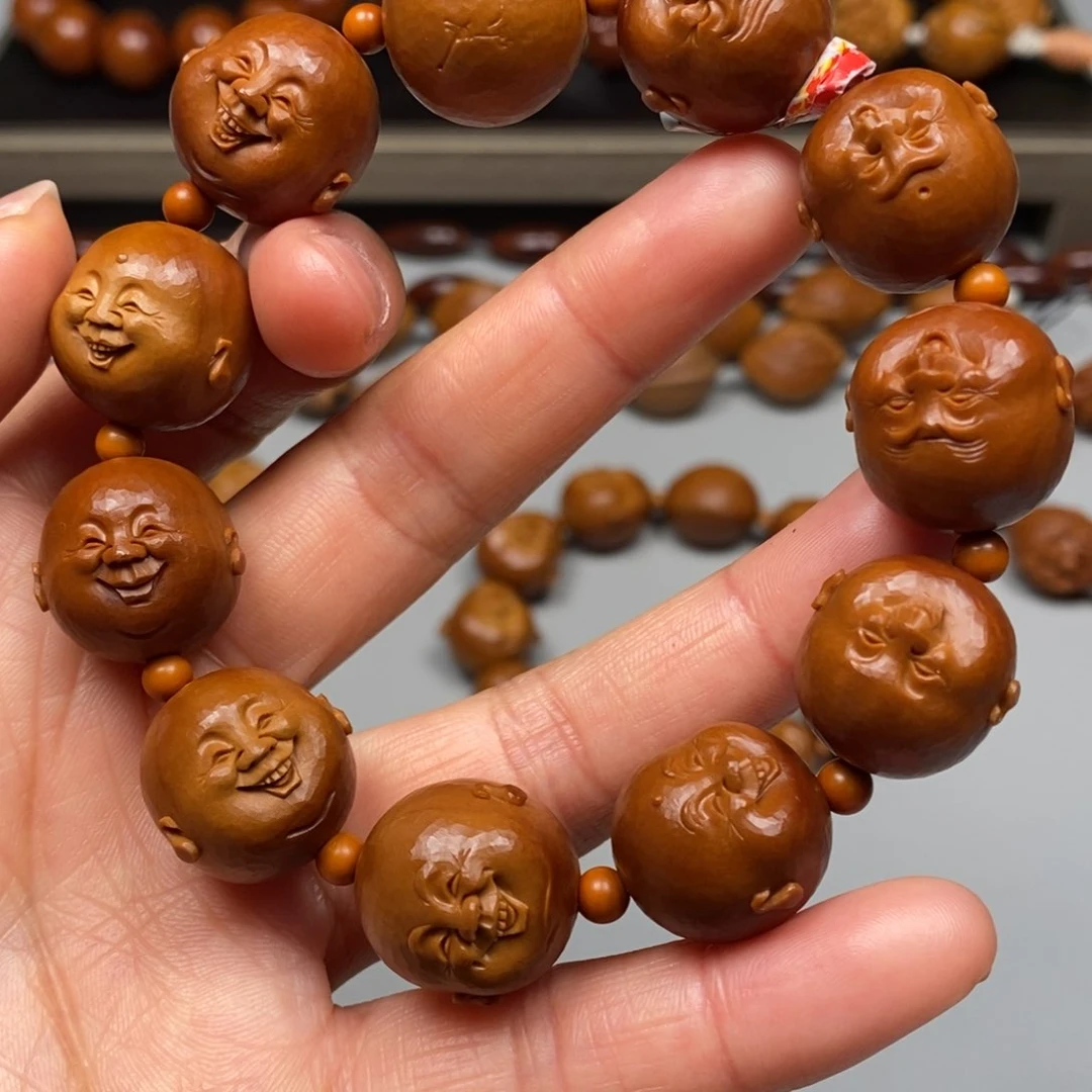 橄榄核吊坠笑佛手串