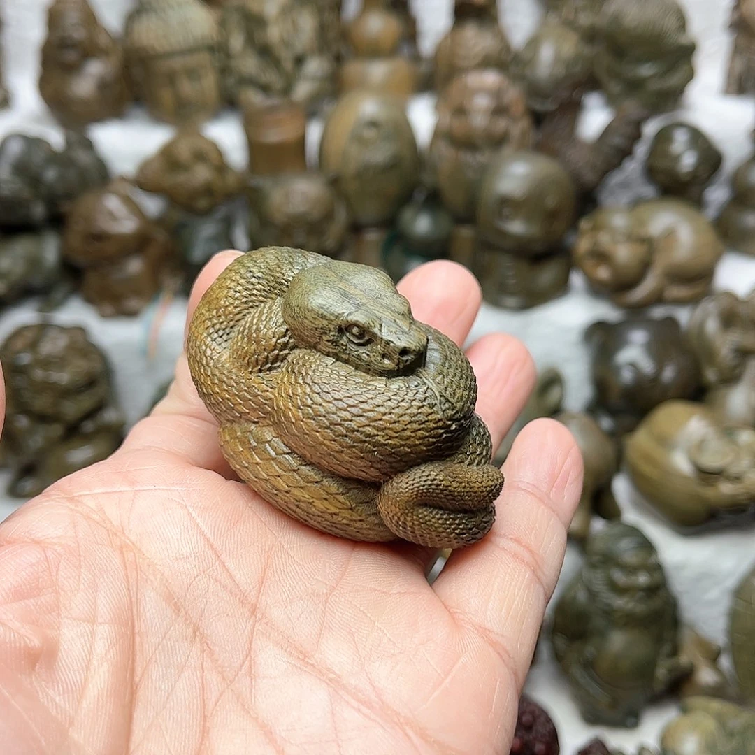 维腊木（绿檀）元*蛇手把件