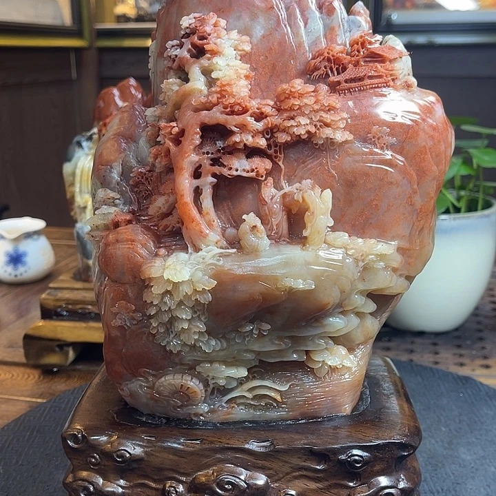 老挝石富贵山居图