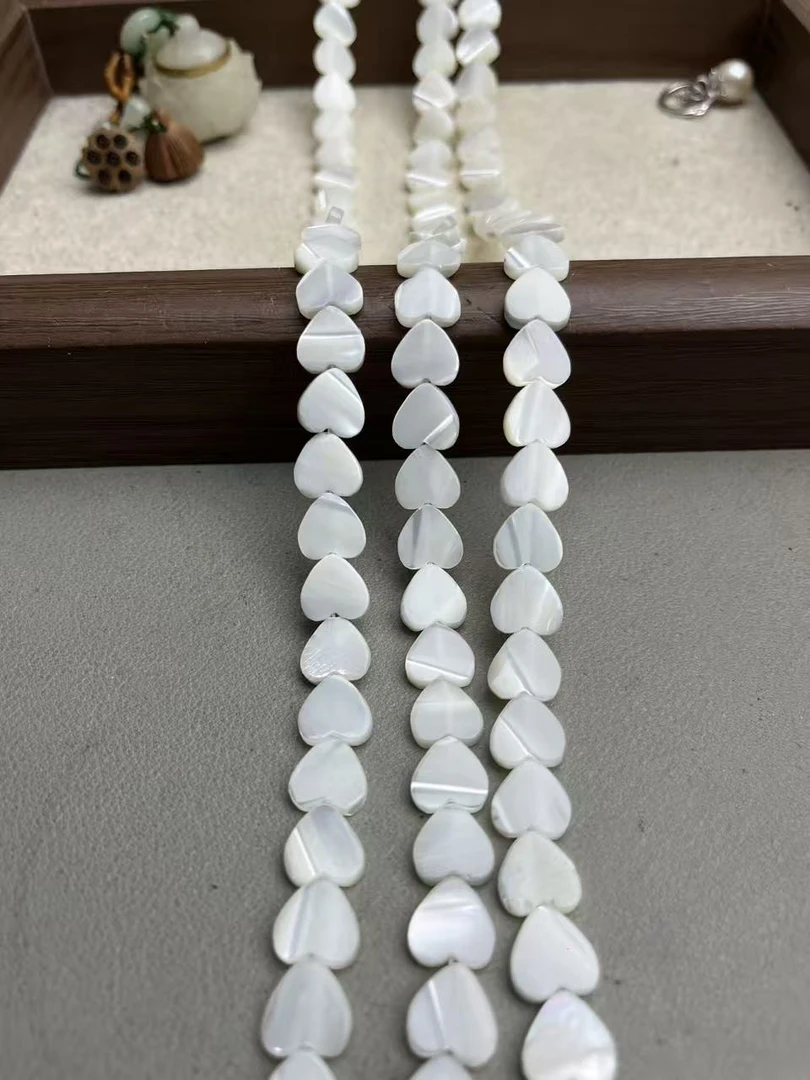 天然10mm左右海水白蝶贝爱心散珠半成品长度39cm左右可DIY当配珠