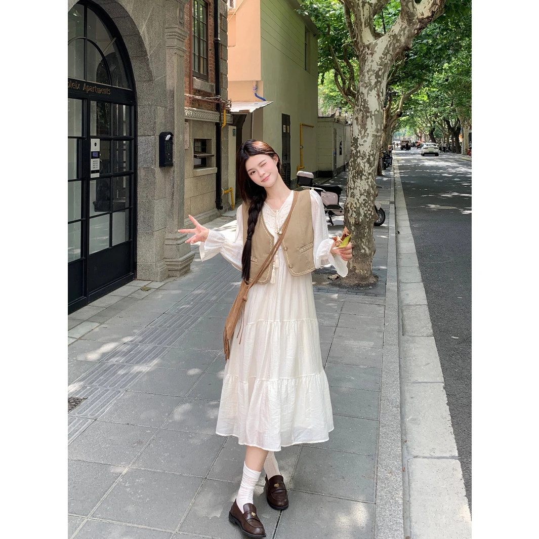 实拍新款法式气质长袖大摆型a字白色连衣裙马甲度假长裙套装女