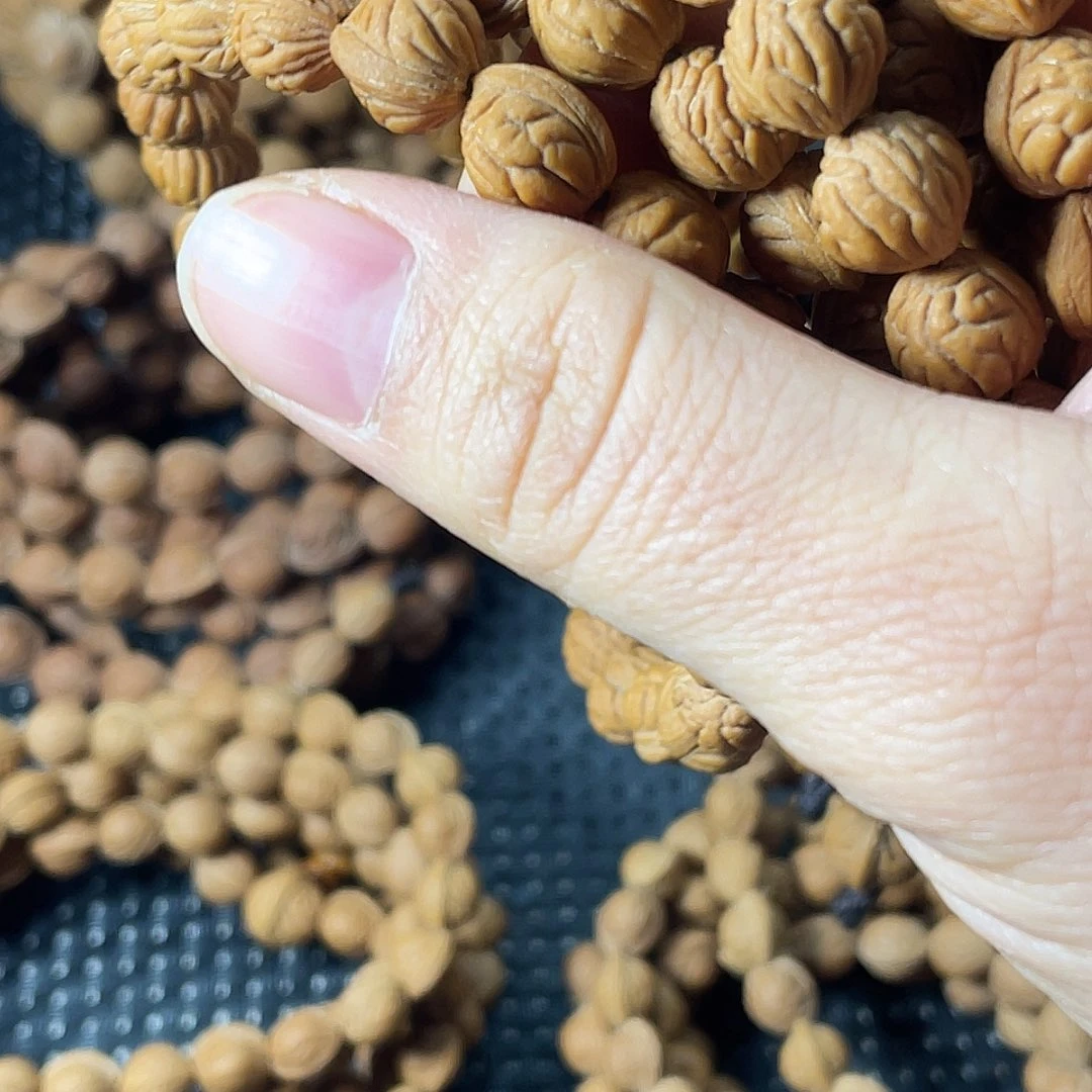 W***M手串桃核金蝉的串