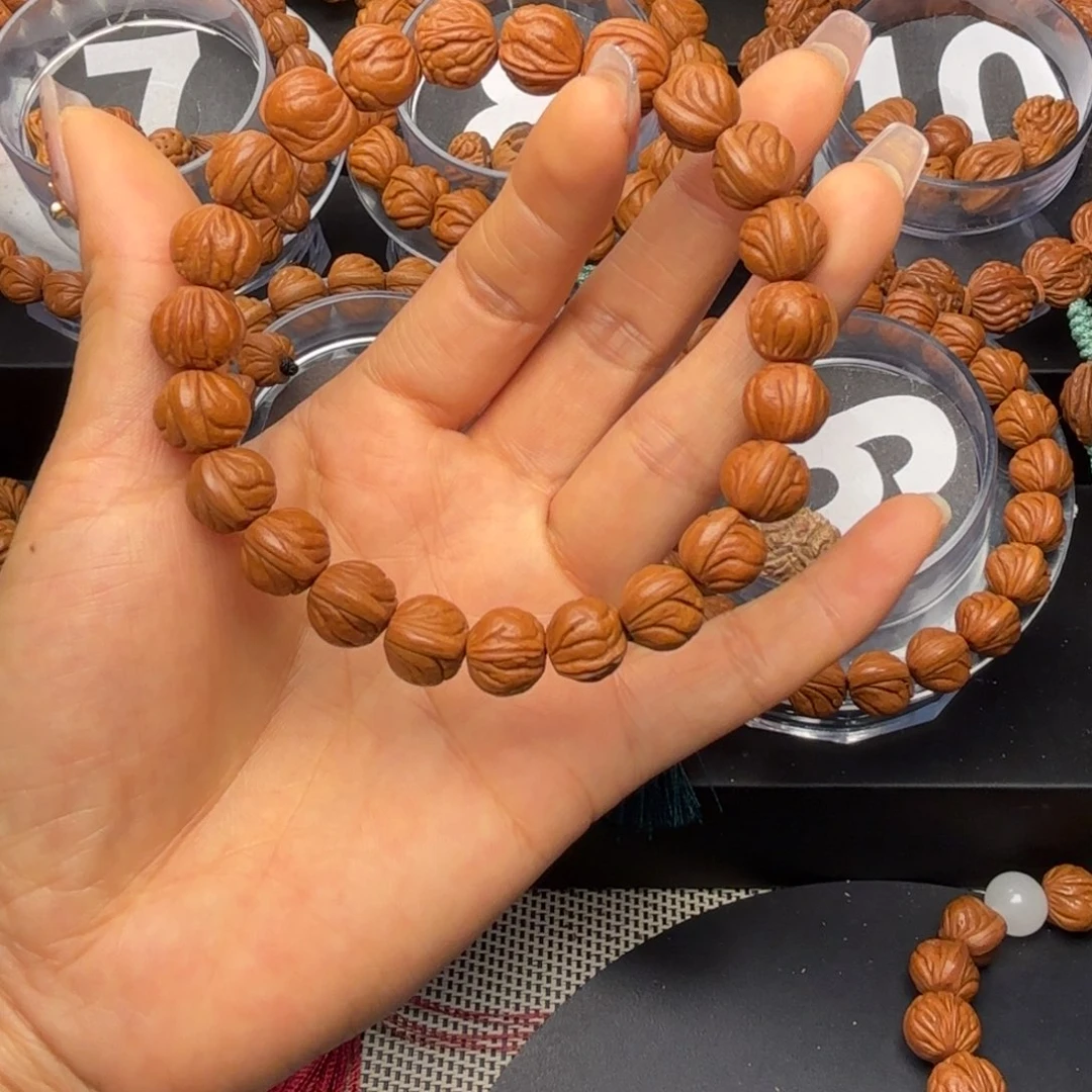 伊***岸吊坠桃核野生红魔11