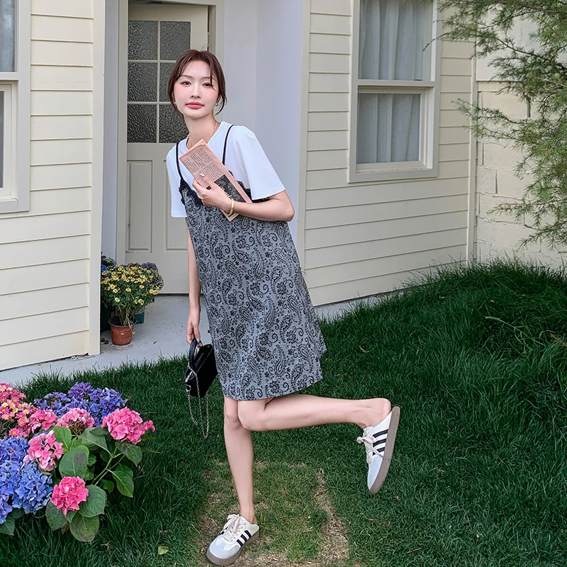 五一出游减龄法式甜美连衣裙女2025夏新款显瘦假两件吊带印花裙子