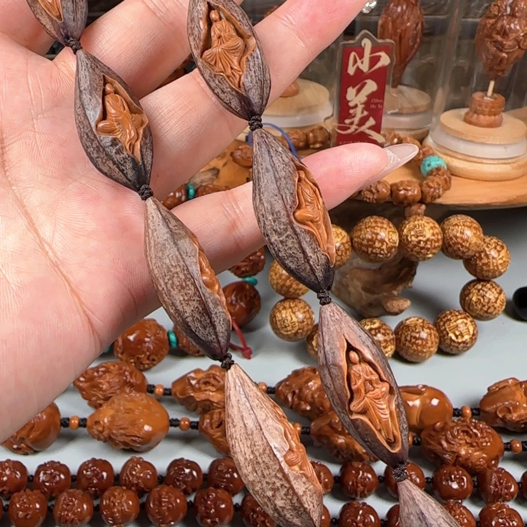橄榄核手串/手链宽1.4稀有梅林紫皮核镂空无相佛手持