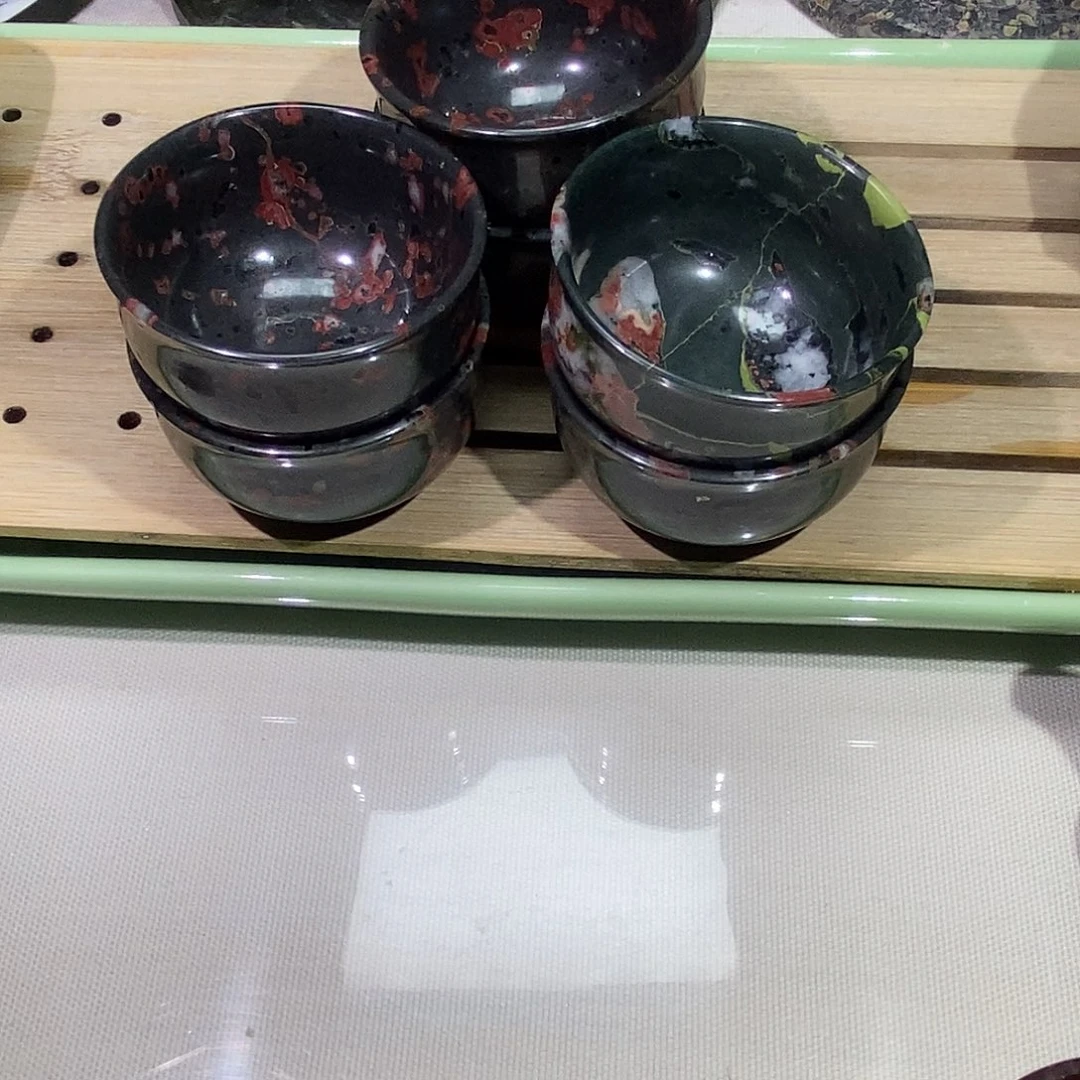 叔****安山玉梅花玉品茗杯微瑕