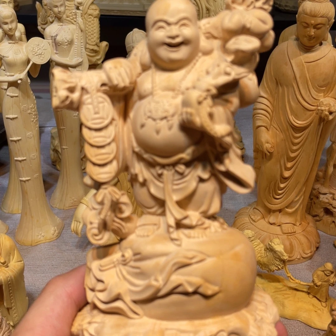 黄杨木瑕疵大号铜钱弥勒佛