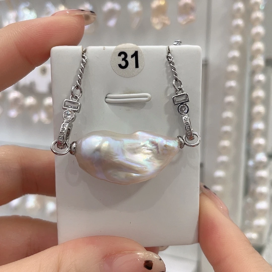 锦***炭未镶嵌淡水珍珠颈饰