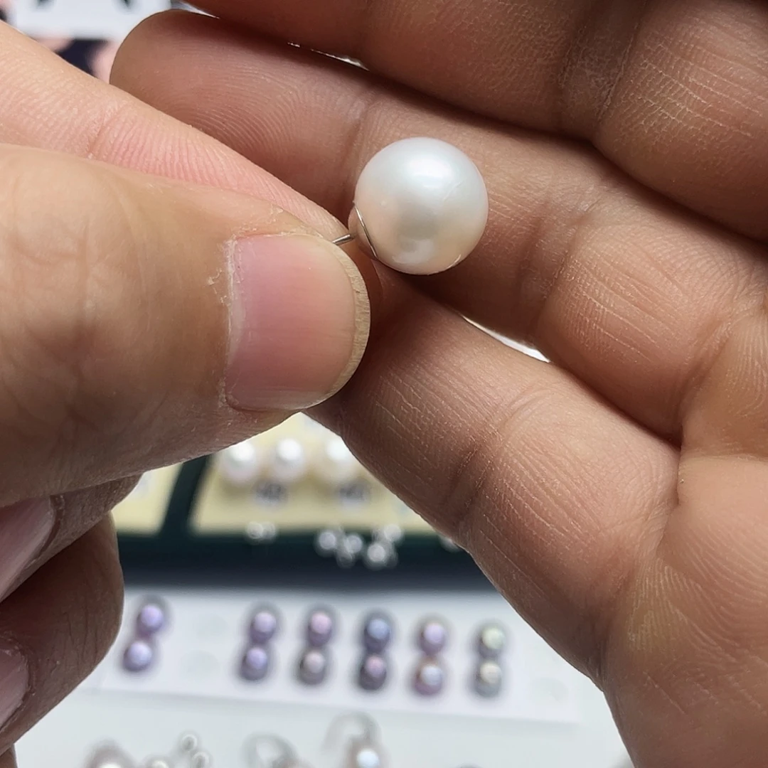 蓉***业淡水珍珠耳饰银S925镶嵌