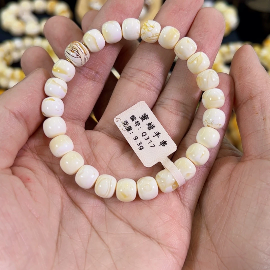 琥珀18K金镶嵌裸石浓瓷白精工老型手串