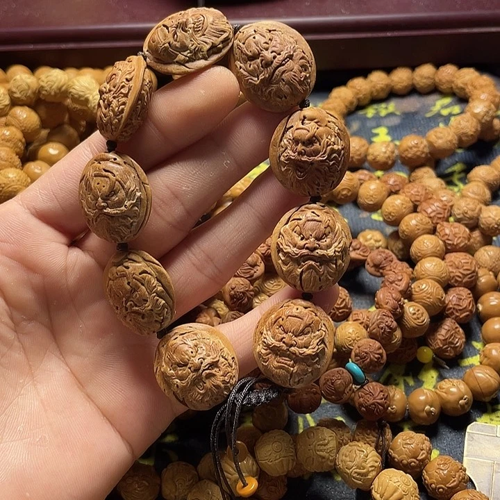 大桃核雕刻双面钟馗头