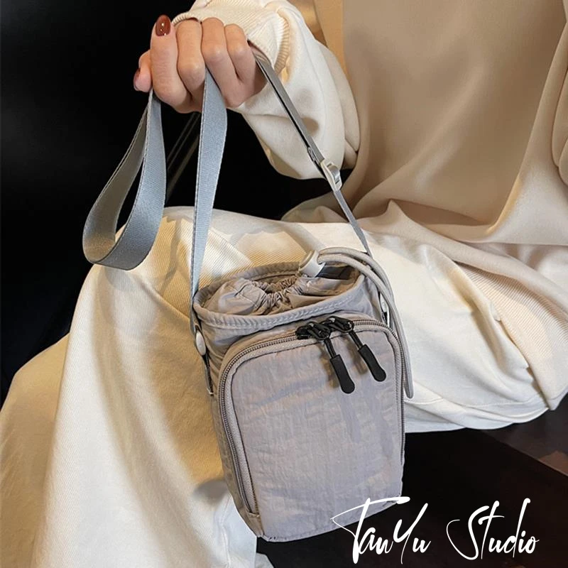 帆布手机包女斜挎2025新款百搭时尚小众设计高级感装手机的小包包