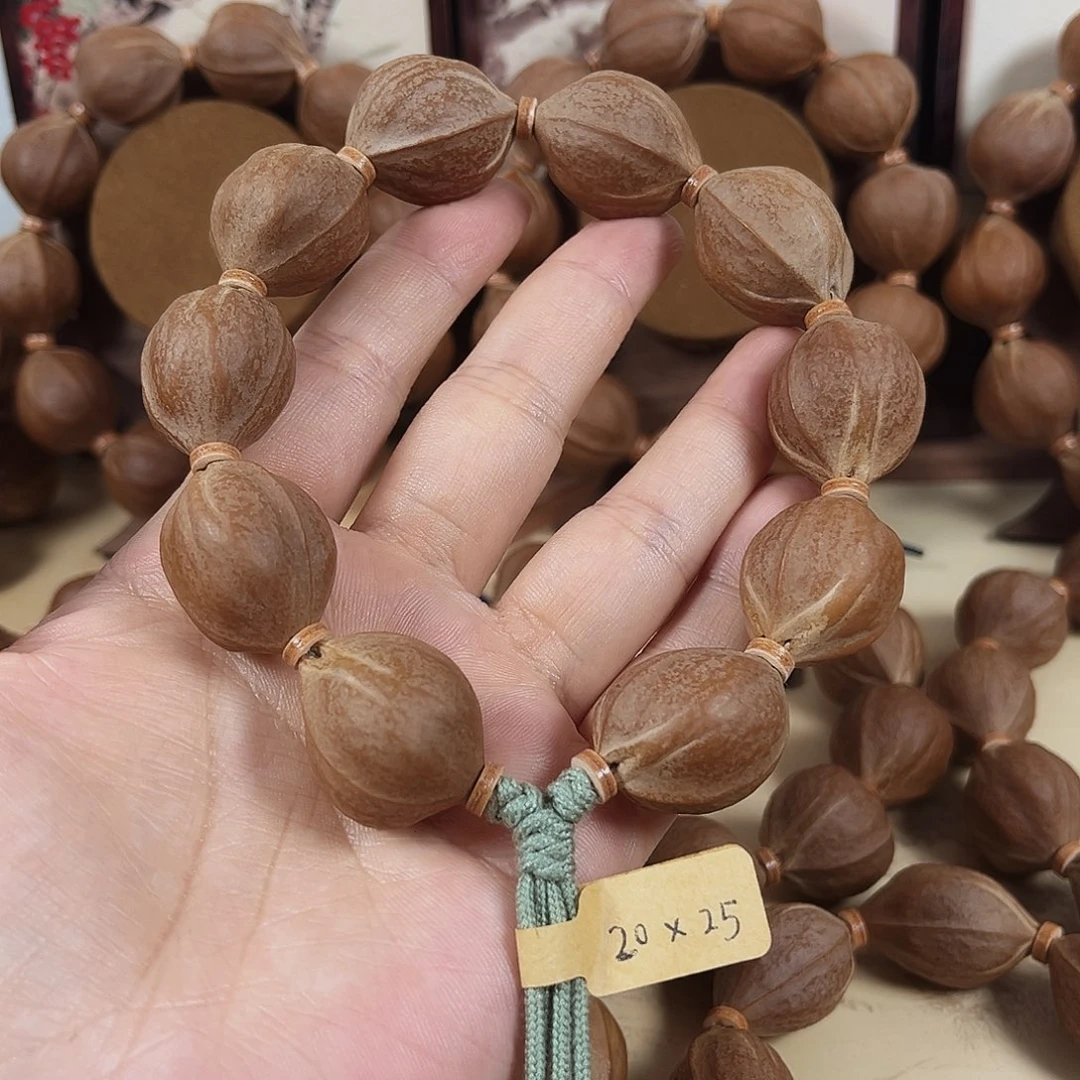 你***。橄榄核手串梅林铁核20.25橄榄核