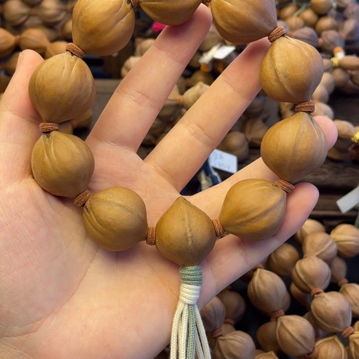 雨***冠橄榄核手串/手链广东铁23*28