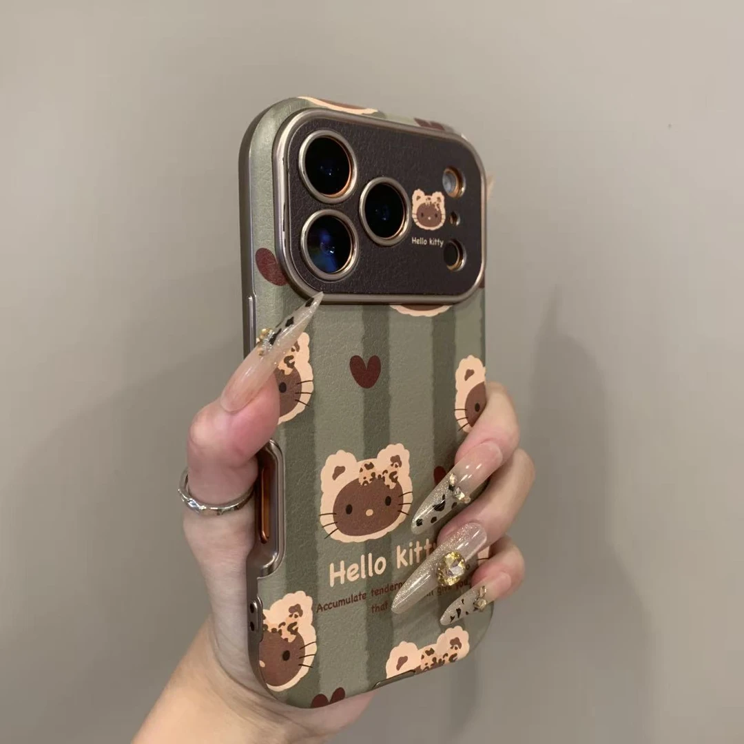 网红可爱哭娃HelloKitty适用苹果17手机壳皮质iPhone16带挂绳14